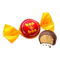 Dulceria 915 Bon o Bon individually wrapped chocolate covered wafer bonbons, one unwrapped showing creamy filling.