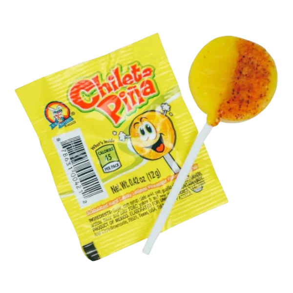 Dulceria 915 Chileta Piña pineapple lollipop with a spicy chili coating on a white stick next to its yellow wrapper.