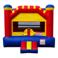 Dulceria 915 red, yellow, and blue castle-themed bounce house with mesh windows and inflatable ramp.
