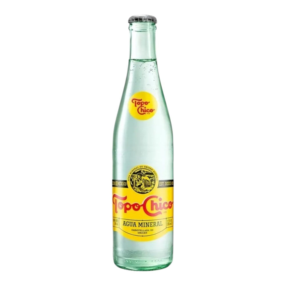 Dulceria 915 Topo Chico sparkling mineral water in a clear glass bottle with yellow and red label.